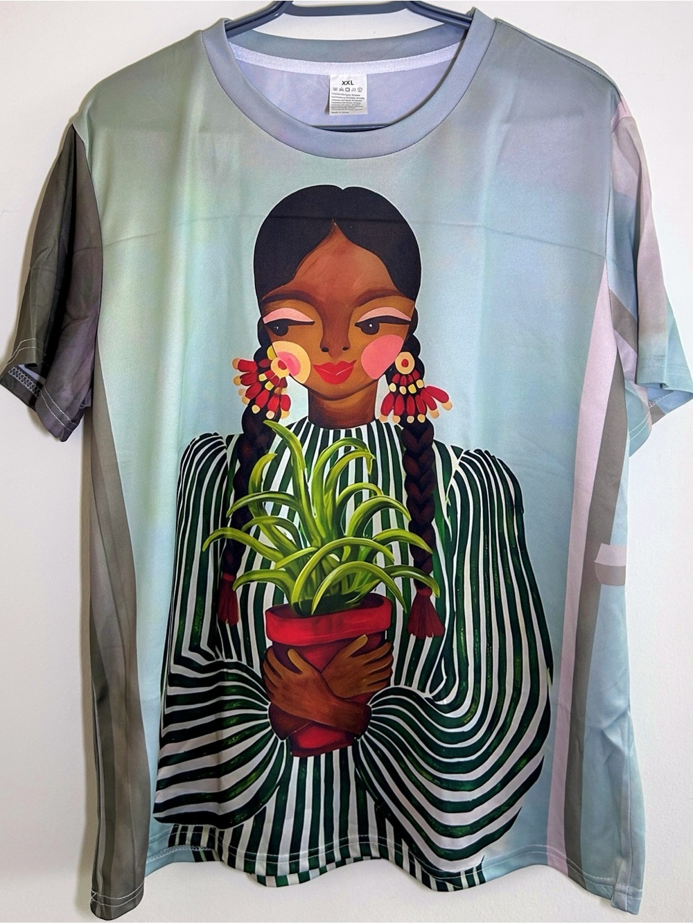 Earth & clay Graphic Tee with Woman Holding Plant - oversized